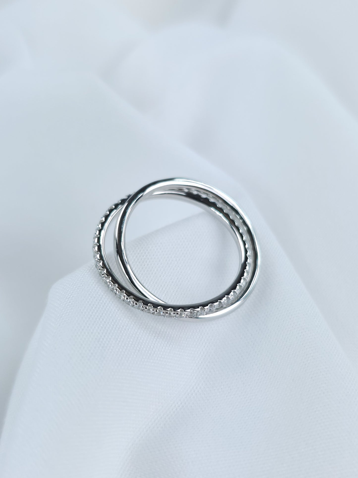 Bague double anneaux en argent 925/1000 rhodié avec oxydes de zirconium